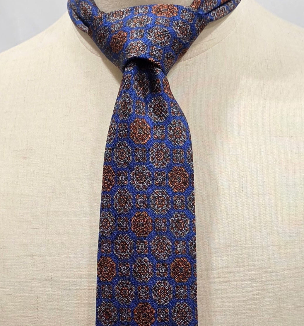 Hampstead by Geoff Nicholson Blue, Rust and Silver Medallion Silk Tie