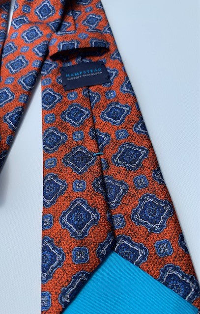 Geoff Nicholson Hamstead Collection Tie Made in Italy Orange and Blue Medallion